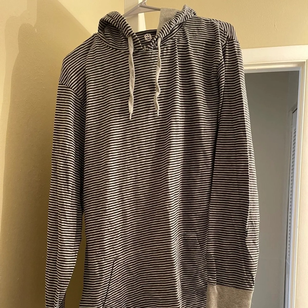 Black and grey striped hooded shirt